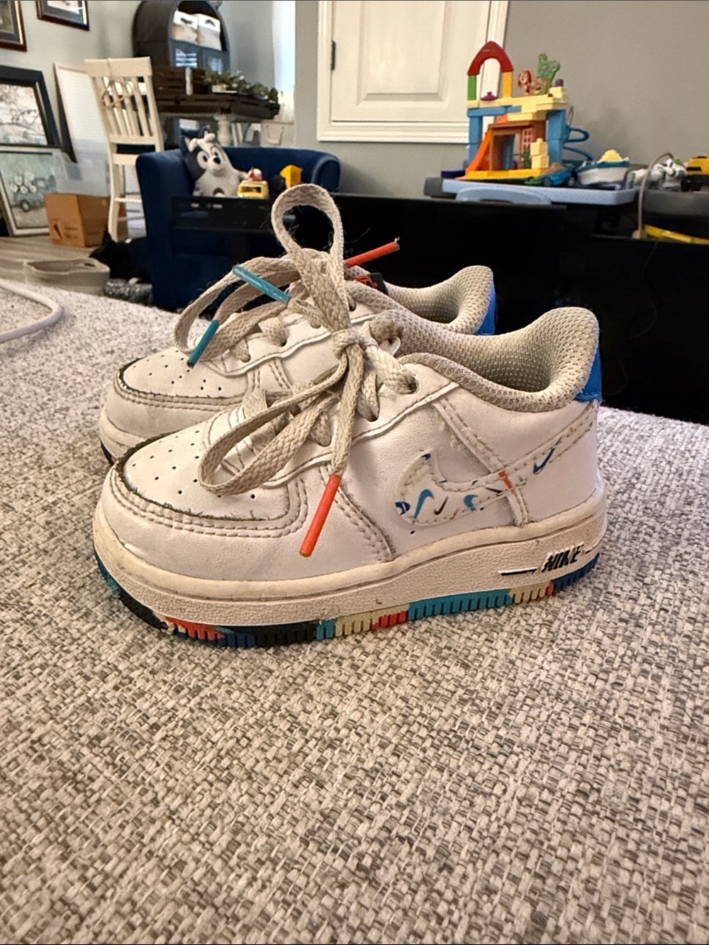 Nike Kids White Leather Sneakers with Blue and Multicolor Accents